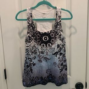 Nice yoga top. Cool blend of cotton, spandex and polyester. never worn
